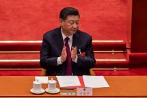 This file photo taken on March 11, 2021 shows China's President Xi Jinping applauding after the result of the vote on changes to Hong Kong's election system was announced during the closing session of the National People’s Congress (NPC) at the Great Hall of the People in Beijing. Photo: AFP
