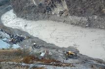 A general view of a rescue operation near the Dhauliganga hydro power project after a portion of Nanda Devi glacier broke off, at Reni village in Chamoli district, Uttrakhand, India, 07 February 2021. Photo: EPA