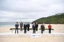  Britain's Prime Minister Boris Johnson (C) poses with the G7 leaders for a family photo during the G7 Summit in Carbis Bay, Britain, 11 June 2021. In picture are seen US President Joe Biden (2-L, front), Britain's Prime Minister Boris Johnson (C), Canada's Prime Minister Justin Trudeau (L), France's President Emmanuel Macron (2-R, front), German Chancellor Angela Merkel (R), Italy's Prime Minister Mario Draghi (2-R, rear), Japan's Prime Minister Yoshihide Suga (2-L, rear), European Commission President Urs