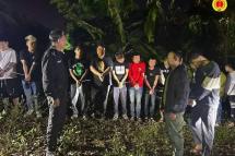 Online scamming gang members arrested on November 23 are being transferred to China (Photo: SSPP Info)