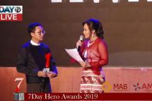Recipients of 7Day Hero awards received cash prizes at a Yangon ceremony on Thursday. Photo: Myanmar Now