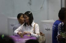 A woman casts her vote during early voting in Yangon, on 08 November 2015. Photo: Hong Sar/Mizzima
