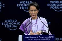 Myanmar State Counsellor Aung San Suu Kyi delivers a speech at the opening of The World Economic Forum (WEF) on ASEAN at the National Convention Center in Hanoi, Vietnam, 12 September 2018. Photo: Luong Thai Linh/EPA