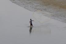 A man fishing inside the Naf river in Maungdaw town of Bangladesh-Myanmar border, Rakhine State. Photo: EPA