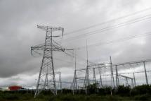 Rain clouds move over electric towers of Hong Kong-listed power generation company VPower Group, which recently suspended two of its nine power stations in Myanmar, at the Thilawa Special Economic Zone, outskirts of Yangon, Myanmar, 23 September 2021. -EPA PIC