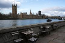 A general view of empty cafe seats opposite the Houses of Parliament in Central London, Britain, 20 March 2020. Photo: EPA