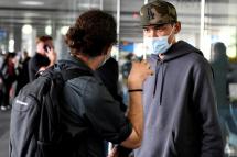 Myanmar journalist Mratt Kyaw Thu (R) is seen at his arrival at Barajas airport, in Madrid, Spain, 01 June 2021. Photo: EPA
