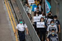 Pan-democrat lawmakers and activists make their way to China’s Liaison Office during a rally against a security law in Hong Kong, China, 22 May 2020. Photo: JEROME FAVRE/EPA
