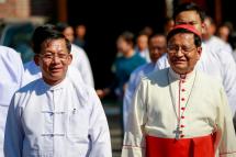 Commander-in-Chief of the Myanmar Armed Forces, General Min Aung Hlaing (L), walks next to Cardinal Charles Maung Bo (R) as he leaves after visiting St. Mary's Cathedral on Christmas Day in Yangon, Myanmar, 25 December 2019. Photo: Lynn Bo Bo/EPA