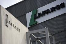 This file photo taken on April 7, 2014 shows the logo on a plant of French cement company Lafarge in Paris. Photo: AFP