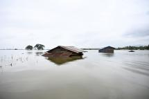 Houses submerged in floodwaters are seen in Shwegyin township, Bago Region on August 8, 2019. Photo: Ye Aung Thu/AFP