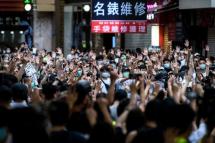 Hong Kong protesters chant slogans during a rally against China's new national security law (AFP Photo/Anthony WALLACE) 