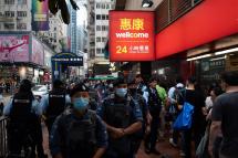 Police patrol in a shopping area near Victoria Park in Hong Kong, China, 04 June 2023. Photo: EPA