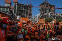 Workers gather outside a worksite as they protest to demand recognition of their labour rights at the downtown area in Yangon on January 19, 2021. Photo: Thura/Mizzima