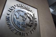 The logo of the International Monetary Fund (IMF) at the entrance of the Headquarters of the IMF, also known as building HQ2, in Washington, DC, USA. Photo: EPA