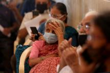 People wait to receive COVID-19 vaccine shots during the vaccination drive at C.V Raman Hospital in Bangalore, India, 03 March 2021. Photo: EPA
