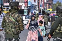 Security personnel stand guard along a street in Srinagar on October 15, 2021, following the killing of two army personnel in an encounter with suspected militants in Poonch district, local media reported. TAUSEEF MUSTAFA / AFP