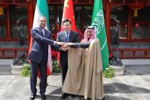 A handout photo made available by Iranian foreign ministry office shows Iranian Foreign Minister Hossein Amir-Abdoulahian (L), Chinese Foreign Minister Qin Gang (C) and Saudi Foreign Minister Prince Faisal bin Farhan Al Saud (R) posing for a photo in Beijing, China, 06 April 2023. Photo: EPA