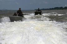 This photo taken May 23, 2019 shows Thai navy personnel patrolling along the Mekong river bordering Thailand and Laos in Tha Utain, Nakhon Phanom province. Photo: Aidan Jones/AFP