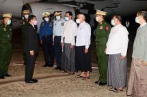 Chairman of State Administration Council Commander-in-Chief of Defence Services Senior General Min Aung Hlaing is being welcomed back by Vice Chairman of the Council Vice-Senior General Soe Win and Council members at Nay Pyi Taw military airport. Photo: MNA