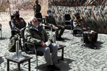 A handout photo made available by the Indian Press Information Bureau (PIB) shows the Prime Minister of India Narendra Modi (2-L) and top Indian army officials in Leh, Ladakh, India, 03 July 2020. Photo: EPA
