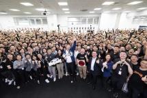 A handout photo made available by Tesla, Inc. shows Tesla CEO Elon Musk (front C) posing for a group photo with his employees at the auto maker's Shanghai factory, in Shanghai, China, 31 May 2023. Photo: EPA