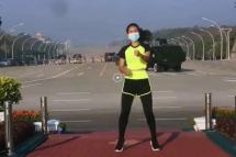 CAPTURE: This woman from Myanmar was recording her aerobics class. Unbeknownst to her, she records the military Junta arriving to the parliament for a coup d'etat in the background