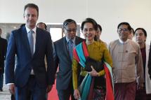 State Counsellor Daw Aung San Suu Kyi being seen off by Union Minister U Min Thu, officials and Ambassador of the Embassy of the Kingdom of the Netherlands in Myanmar Mr Wouter Jurgens at the Nay Pyi Taw International Airport yesterday. Photo: MNA