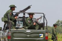 (File) Heavily armed Myanmar army troops patrol Kyinkanpyin area in Maungdaw town located in Rakhine near the Bangladesh border on October 16, 2016. Photo: AFP