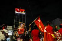 (File) Supporters of National League for Democracy (NLD) party, led by Myanmar State Counsellor Aung San Suu Kyi, celebrate in front of the party headquarters on the evening of general elections day in Yangon, Myanmar, 08 November 2020. Photo: EPA