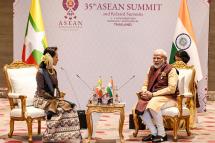 In this handout photograph taken and released by the Indian Press Information Bureau on November 3, 2019, India's Prime Minister Narendra Modi (R) interacts with Myanmar's State Counsellor Aung San Suu Kyi (L), on the sidelines of the 35th Association of Southeast Asian Nations (ASEAN) Summit in Bangkok. Photo: PIB/AFP