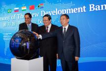 Flashback - (L-R) The President of the New Development Bank (NDB), Kundapur Vaman Kamath of India, China's Finance Minister Lou Jiwei and Shanghai's mayor Yang Xiong, attend the opening ceremony of the NDB in Shanghai, China 21 July 2015. Photo: EPA

