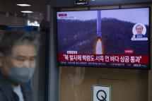 (File) A man watches the news at a station in Seoul, South Korea, 31 May 2023. Photo: EPA