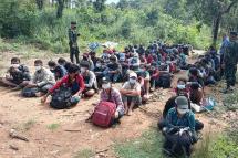 (File) In this handout photo from the Royal Thai Army taken and released on November 1, 2021, Myanmar migrants are pictured after being apprehended by Thai military personnel in Kanchanaburi province, bordering Myanmar. Photo: AFP