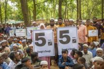Rohingya refugees take part in a protest held to mark the five year anniversary of the mass migration of Rohingya refugees from Myanmar to Bangladesh, at a makeshift camp in Kutubpalang, Ukhiya, Cox Bazar district, Bangladesh, 25 August 2022. Photo: EPA
