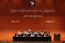 (L-R first row) Thu Wai, Chairman Democratic Party, Lt-general Tin Maung Win, Tin Myo Win Chairman of Peace Commission, KNU vice chairman Saw kawl Htoo win and Lower house parliament member Htun Htun Hain sign during the Union Accord signing during the closing ceremony of the second session of the 'Union Peace Conference - 21st century Panglong' in Naypyitaw, Myanmar, 29 May 2017. Photo: Hein Htet/EPA
