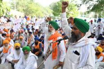 Farmers shout slogans against the Punjab State Power Corporation Limited (PSPCL) for failing to provide sufficient power supply in agriculture sector, in Amritsar on June 30, 2021.  Photo: AFP