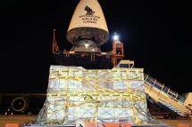A handout image from the Ministry of Communications and Information shows a shipment of the Covid-19 vaccine unloaded from a Singapore Airlines Boeing 747 cargo plane at the Changi Airport in Singapore, 21 December 2020. Photo: EPA