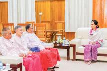 State Counsellor Daw Aung San Suu Kyi meets with New Mon State Party Chairman Nai Han Thar and party at the NRPC in Nay Pyi Taw on January 30. Photo: MNA