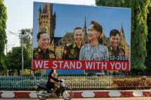 Billboards have started to appear in Myanmar, supporting the civilian leader's decision to represent the country at the International Court of Justice (AFP Photo)