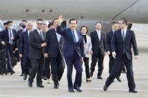 A handout photo made available by the Ma Yung-jeou office, shows Taiwan's former President Ma Ying-jeou (C), waving upon his arrival on Shanghai Pudong International airport, in Shanghai, China, 27 March 2023. Photo: EPA