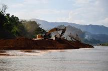 Beijing has long wanted to blast 97 kilometres (60 miles) of rocks and dredge the riverbed in northern Thailand to open up a passage for massive cargo ships (AFP / Lillian SUWANRUMPHA)