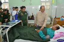 President U Thein Sein visits injured military personnel and families of soldiers killed during clashes with Kokang fighters in Laukkai area, Shan State, on February 16, 2015. Photo: President's Office
