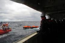 A handout photo made available by the Korean Coast Guard shows members of the Coast Guard engaging in a search and rescue operation in waters 148.2 kilometers southeast of Seogwipo, Jeju Island, South Korea, 25 January 2023, after Jin Tian, a Hong Kong-registered cargo ship carrying 22 crew members, sank off the southern island. Photo: EPA