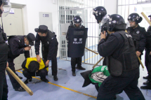 This undated handout image released by The Victims of Communism Memorial Foundation on May 24, 2022, shows SWAT team personnel engaged in an apparent anti-escape or anti-riot drill at the Tekes County Detention Centre in the Xinjiang Region of western China in February 2018. Photo: AFP