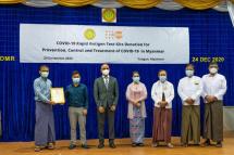 Officials from Ministry of Health and Sports and UNFPA at the ceremony of the handover of 40,000 COVID-19 Antigen Test Kits. Photo: UNFPA Myanmar
