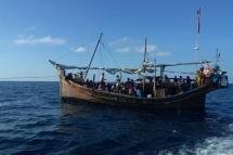 At least 100 mostly women and children aboard a sticken wooden vessel off Aceh province were denied refuge in Indonesia (AFP/STR)