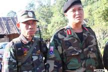 Col. Nerdah Mya, right, of the Karen National Liberation Army and Lieutenant Steel, the commanding officer of Democratic Karen Buddhist Army Battalion 909. The photograph was taken at an unknown location.