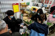 Many Beijing residents rushed to supermarkets to buy food after rumours spread that a strict lockdown was about to be announced. Photo: AFP