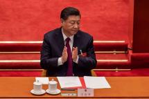 This file photo taken on March 11, 2021 shows China's President Xi Jinping applauding after the result of the vote on changes to Hong Kong's election system was announced during the closing session of the National People’s Congress (NPC) at the Great Hall of the People in Beijing. (Photo: AFP)